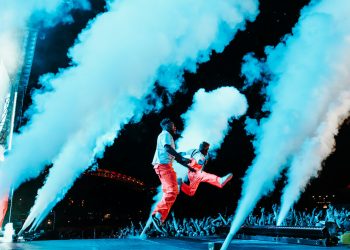two person performing on stage