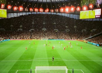 a soccer stadium filled with lots of people