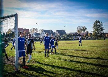 group of football player under blue sky