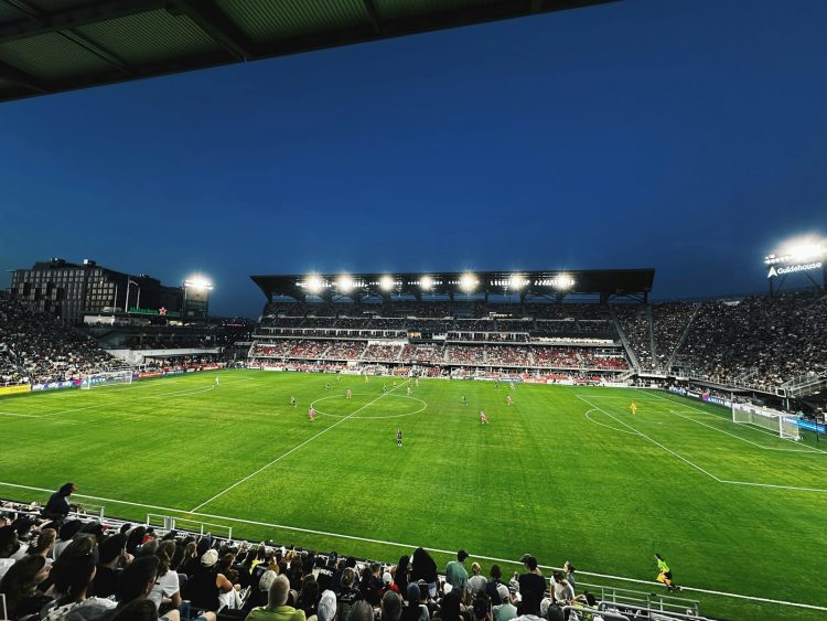 A soccer stadium filled with lots of people