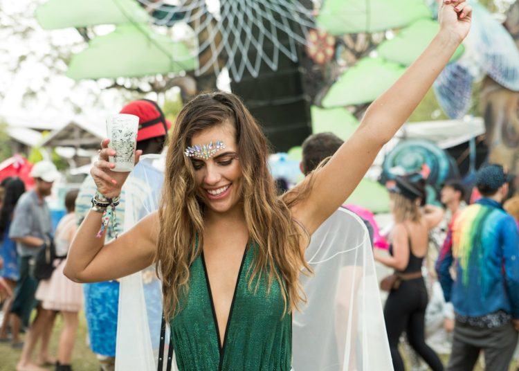 woman raising her hand